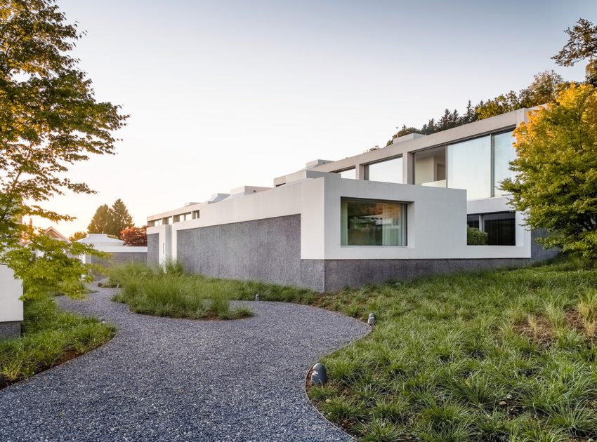 A Stunning Modern House with Four Courtyards in Zumikon, Switzerland by Think Architecture (3)