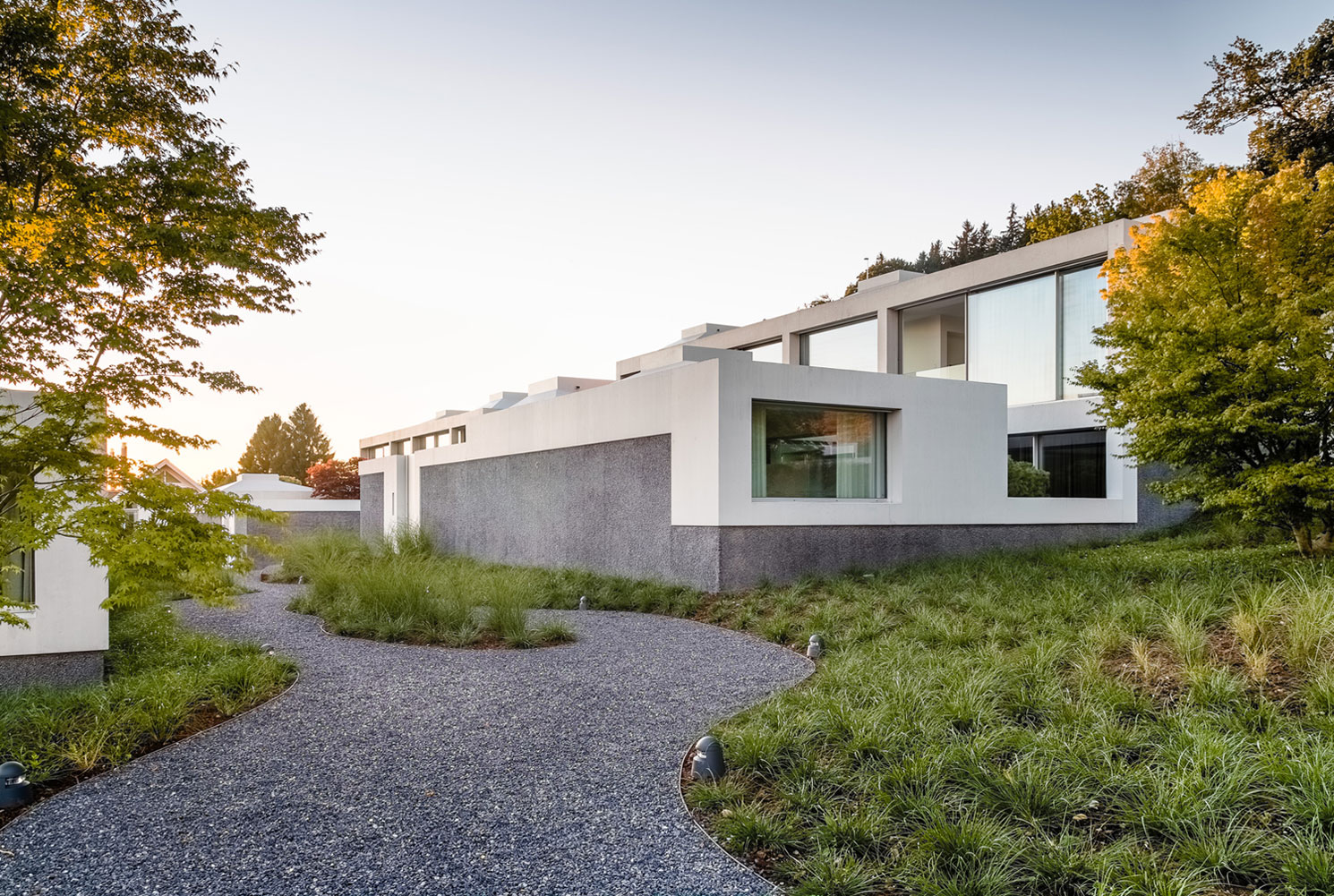 A Stunning Modern House with Four Courtyards in Zumikon, Switzerland by Think Architecture (3)