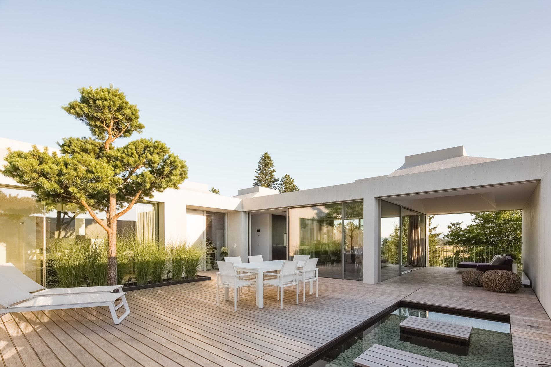 A Stunning Modern House with Four Courtyards in Zumikon, Switzerland by Think Architecture (7)