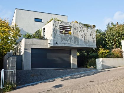 A Stunning Sculptural Concrete Villa in Bratislava, Slovakia by ARCHITEKTI ŠEBO LICHÝ (1)