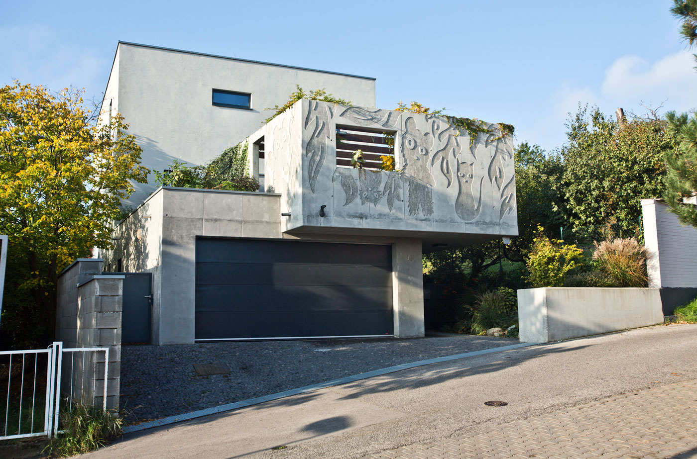 A Stunning Sculptural Concrete Villa in Bratislava, Slovakia by ARCHITEKTI ŠEBO LICHÝ (1)