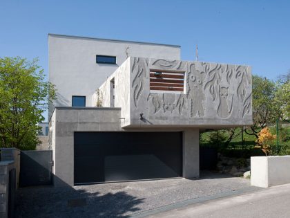 A Stunning Sculptural Concrete Villa in Bratislava, Slovakia by ARCHITEKTI ŠEBO LICHÝ (2)