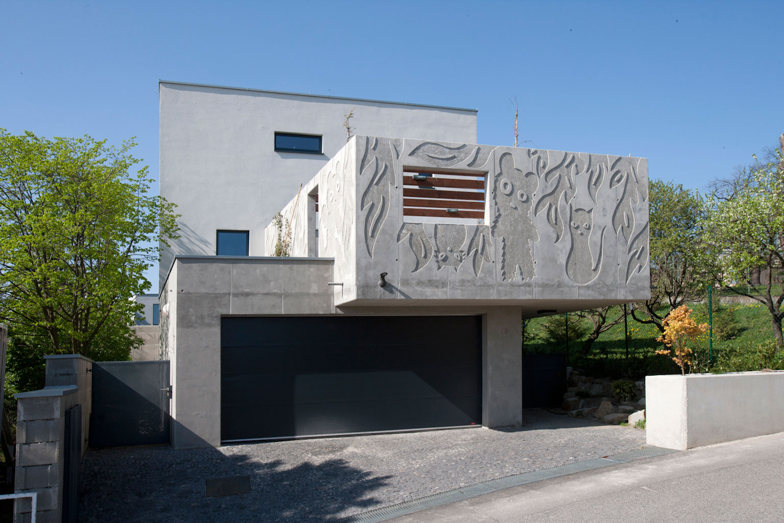 A Stunning Sculptural Concrete Villa in Bratislava, Slovakia by ARCHITEKTI ŠEBO LICHÝ (2)