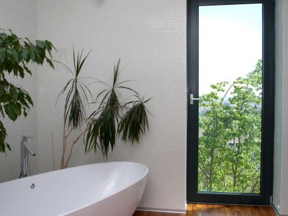 A Stunning Sculptural Concrete Villa in Bratislava, Slovakia by ARCHITEKTI ŠEBO LICHÝ (20)