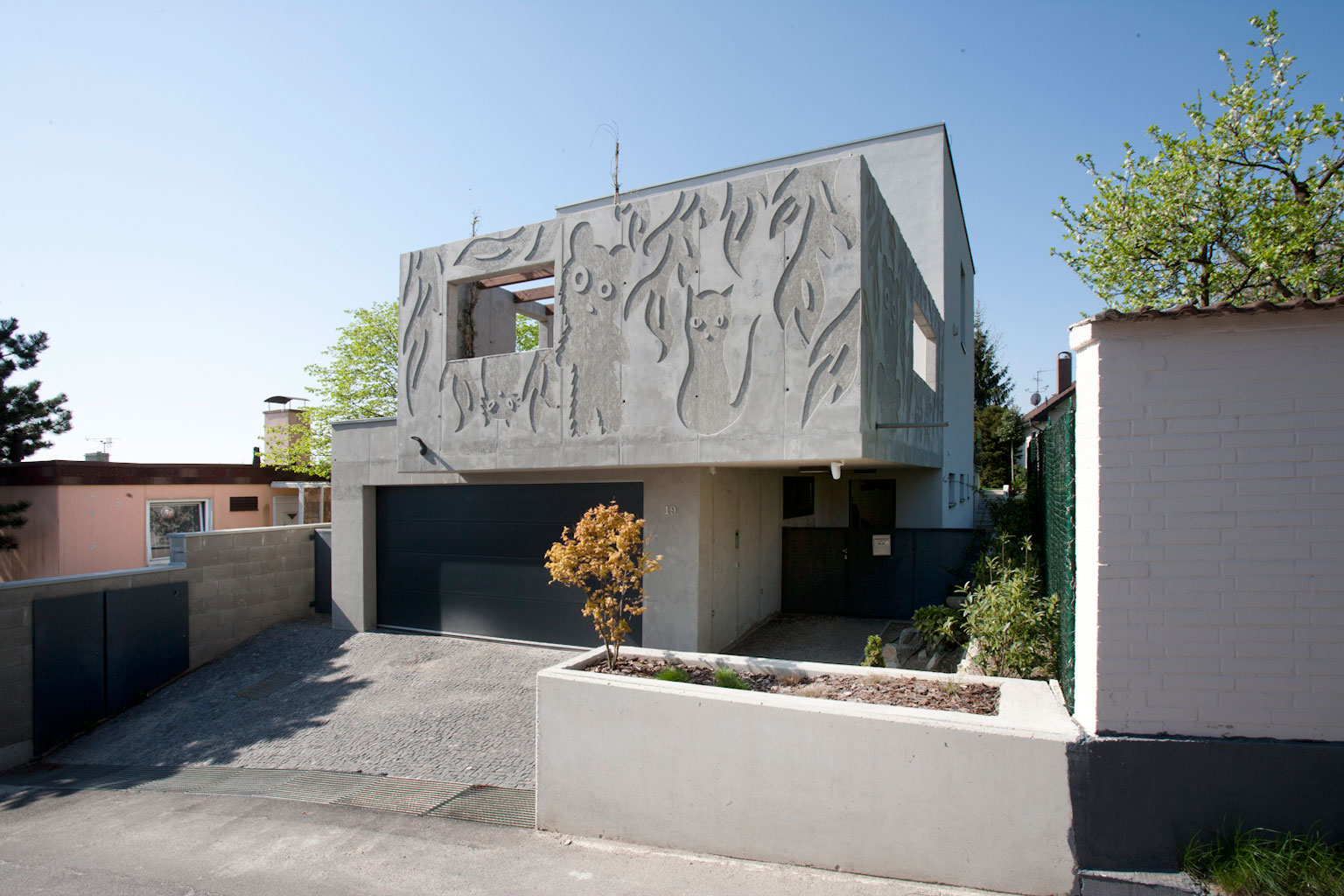 A Stunning Sculptural Concrete Villa in Bratislava, Slovakia by ARCHITEKTI ŠEBO LICHÝ (3)