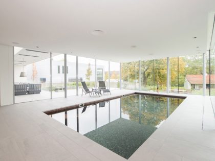 A Stunning and Luminous Contemporary Home on the Edge of a Pretty Man-Made River by LIAG architects (11)