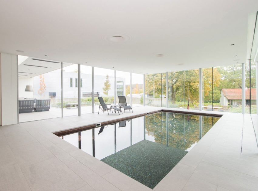 A Stunning and Luminous Contemporary Home on the Edge of a Pretty Man-Made River by LIAG architects (11)