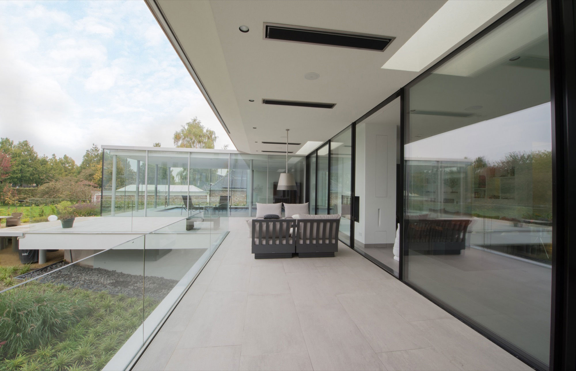 A Stunning and Luminous Contemporary Home on the Edge of a Pretty Man-Made River by LIAG architects (5)