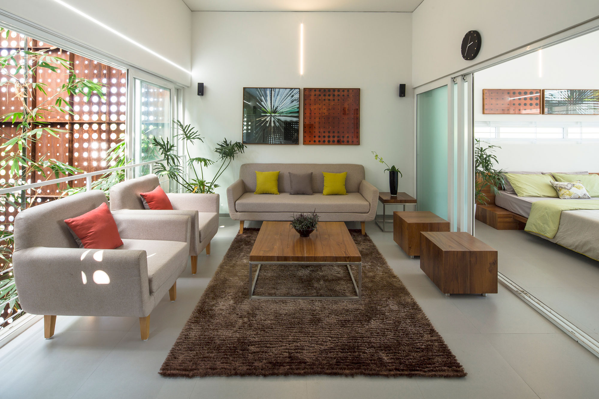 A Stunning and Spacious Home Framed by Perforated Corten Steel Walls in Kerala, India by LIJO.RENY Architects (10)