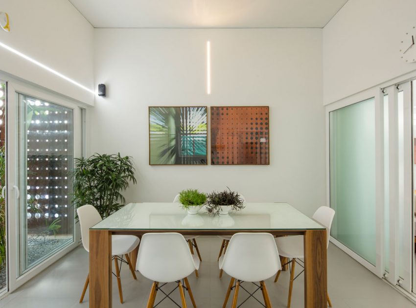 A Stunning and Spacious Home Framed by Perforated Corten Steel Walls in Kerala, India by LIJO.RENY Architects (12)