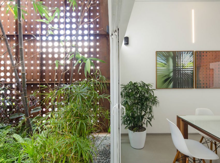 A Stunning and Spacious Home Framed by Perforated Corten Steel Walls in Kerala, India by LIJO.RENY Architects (13)