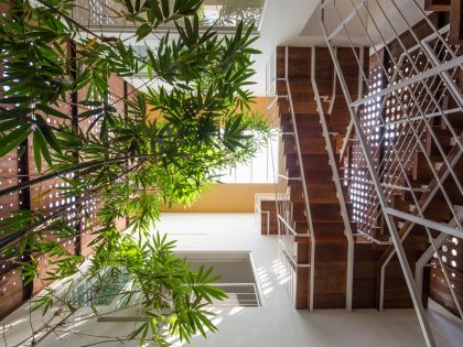 A Stunning and Spacious Home Framed by Perforated Corten Steel Walls in Kerala, India by LIJO.RENY Architects (15)