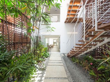 A Stunning and Spacious Home Framed by Perforated Corten Steel Walls in Kerala, India by LIJO.RENY Architects (16)