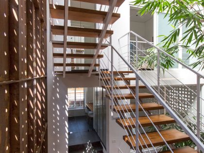 A Stunning and Spacious Home Framed by Perforated Corten Steel Walls in Kerala, India by LIJO.RENY Architects (17)