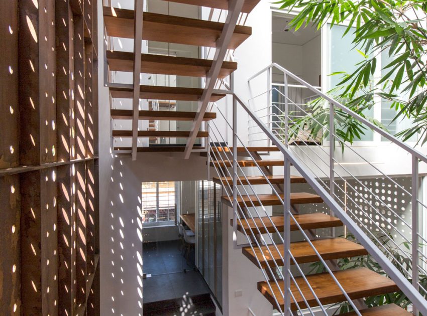 A Stunning and Spacious Home Framed by Perforated Corten Steel Walls in Kerala, India by LIJO.RENY Architects (17)