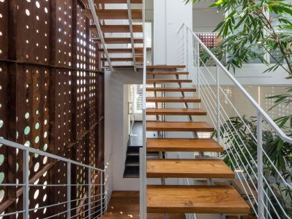 A Stunning and Spacious Home Framed by Perforated Corten Steel Walls in Kerala, India by LIJO.RENY Architects (18)