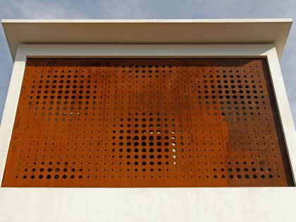 A Stunning and Spacious Home Framed by Perforated Corten Steel Walls in Kerala, India by LIJO.RENY Architects (2)