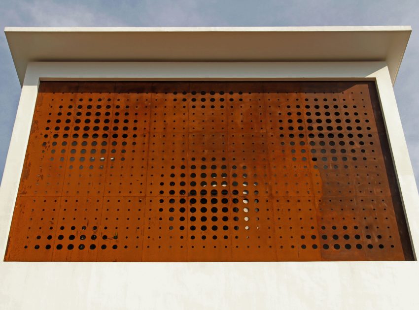 A Stunning and Spacious Home Framed by Perforated Corten Steel Walls in Kerala, India by LIJO.RENY Architects (2)