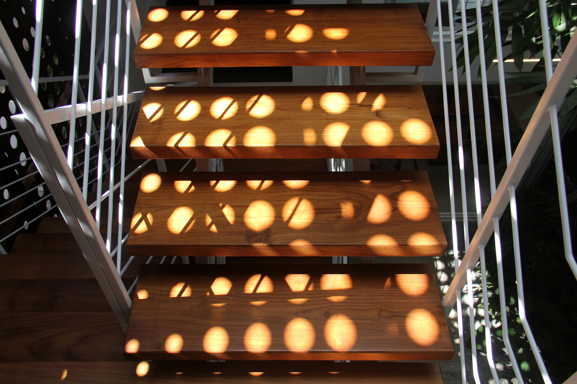 A Stunning and Spacious Home Framed by Perforated Corten Steel Walls in Kerala, India by LIJO.RENY Architects (21)