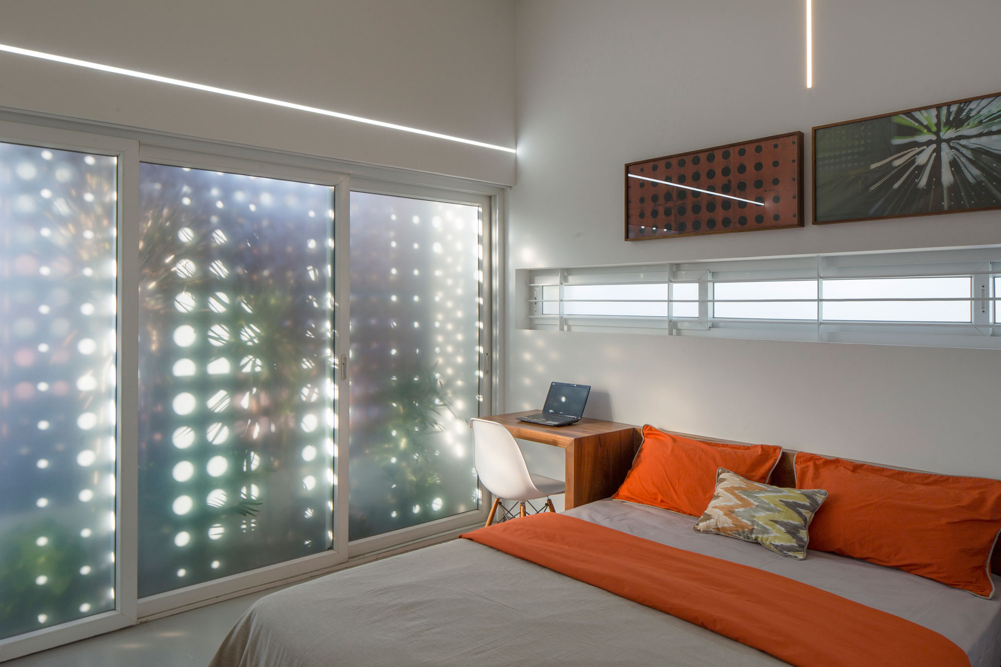 A Stunning and Spacious Home Framed by Perforated Corten Steel Walls in Kerala, India by LIJO.RENY Architects (25)