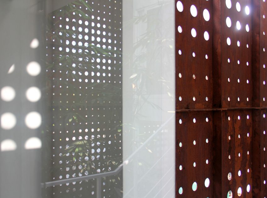 A Stunning and Spacious Home Framed by Perforated Corten Steel Walls in Kerala, India by LIJO.RENY Architects (27)