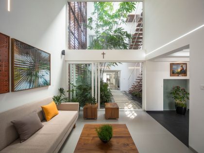 A Stunning and Spacious Home Framed by Perforated Corten Steel Walls in Kerala, India by LIJO.RENY Architects (6)