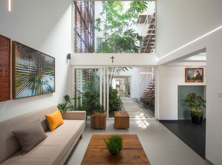 A Stunning and Spacious Home Framed by Perforated Corten Steel Walls in Kerala, India by LIJO.RENY Architects (6)