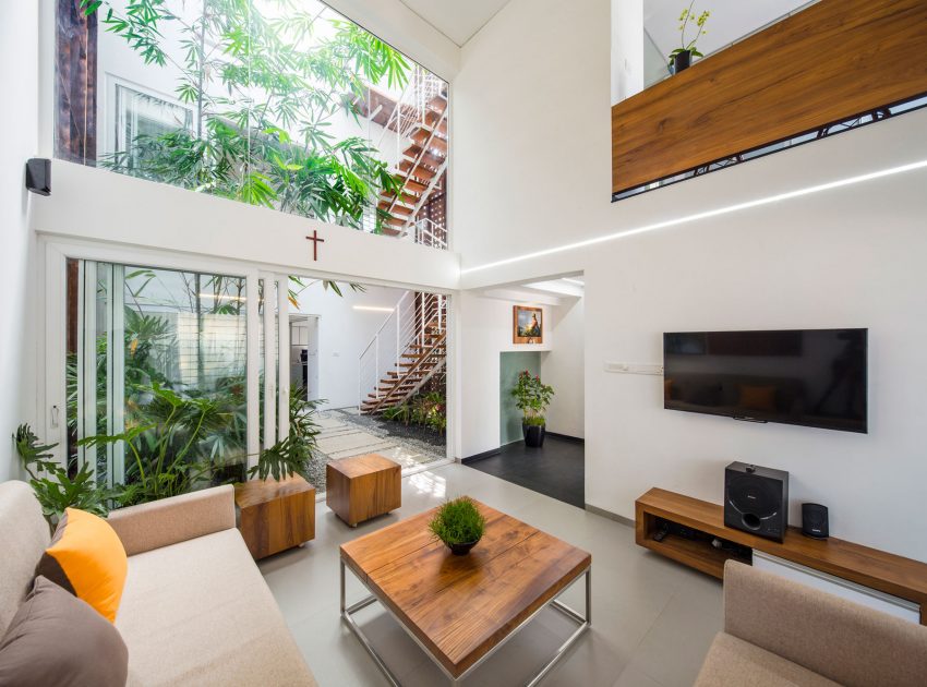 A Stunning and Spacious Home Framed by Perforated Corten Steel Walls in Kerala, India by LIJO.RENY Architects (7)