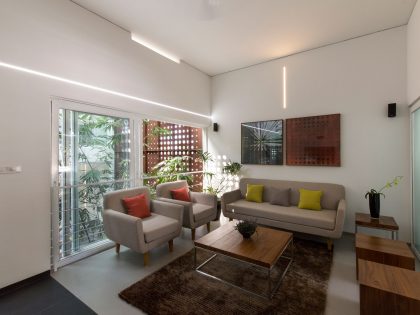 A Stunning and Spacious Home Framed by Perforated Corten Steel Walls in Kerala, India by LIJO.RENY Architects (9)