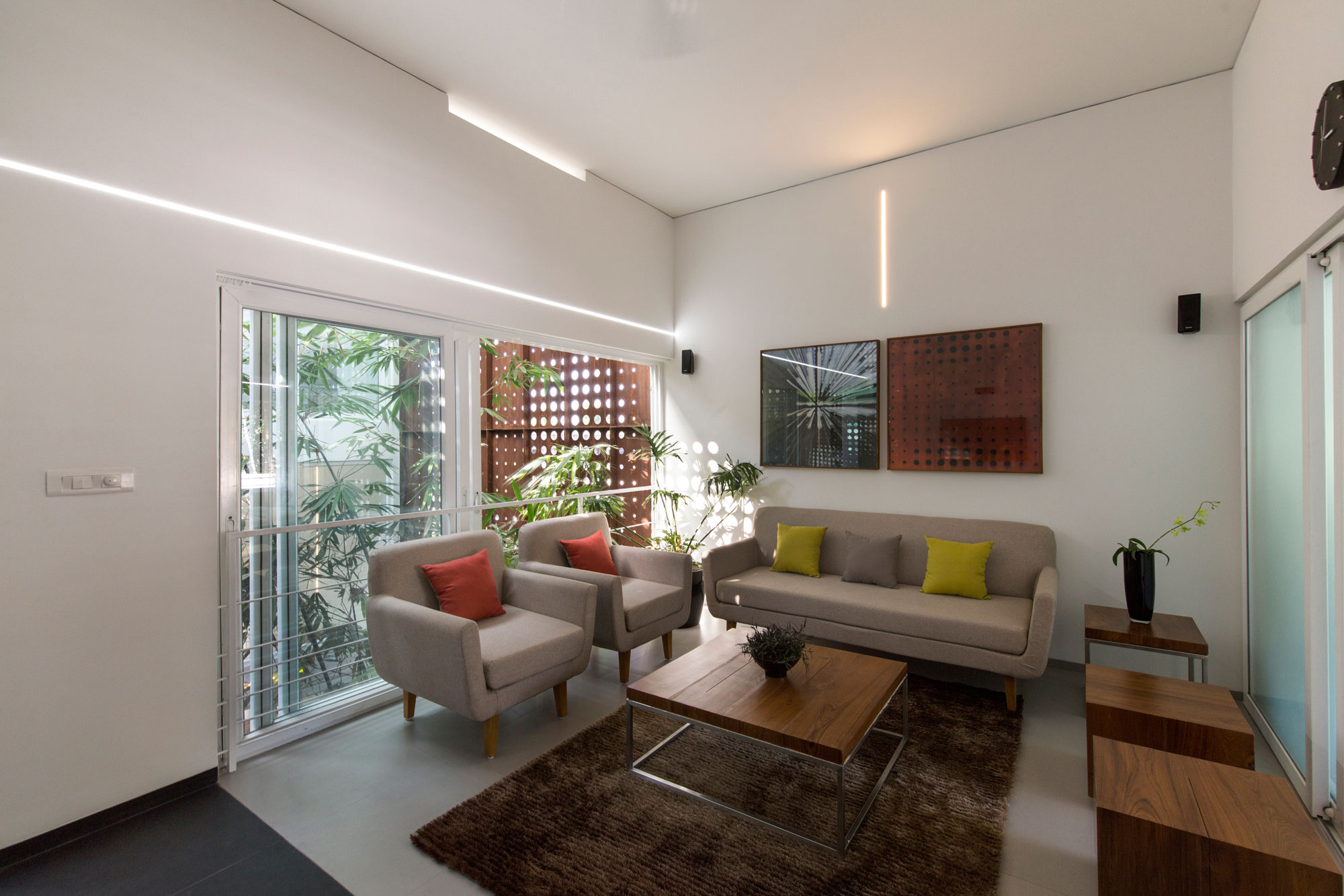 A Stunning and Spacious Home Framed by Perforated Corten Steel Walls in Kerala, India by LIJO.RENY Architects (9)