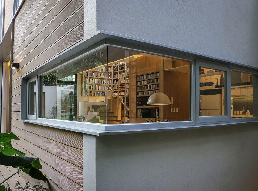 A Stunning Contemporary Home with a Large Bookshelf in Mexico City by Paul Cremoux Studio (12)