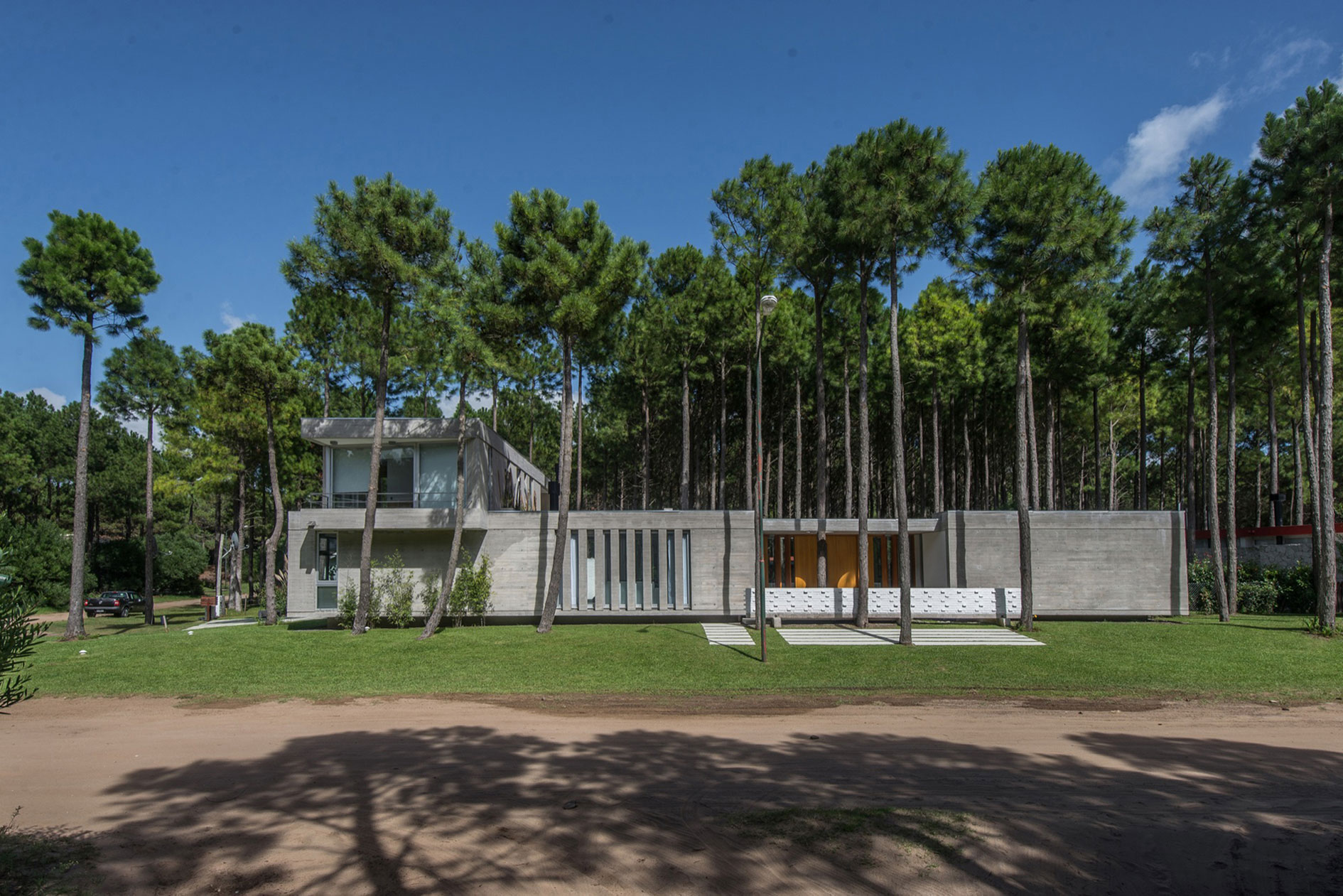 A Stylish Concrete Home Flanked by a Lush Pine Forest in Pinamar by Estudio Galera (1)