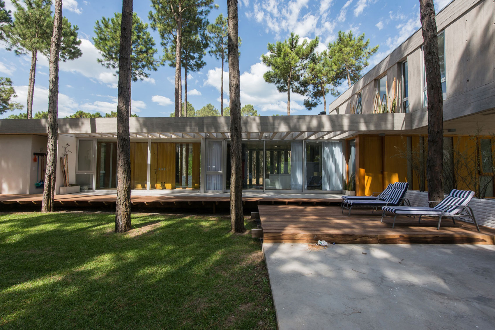 A Stylish Concrete Home Flanked by a Lush Pine Forest in Pinamar by Estudio Galera (11)