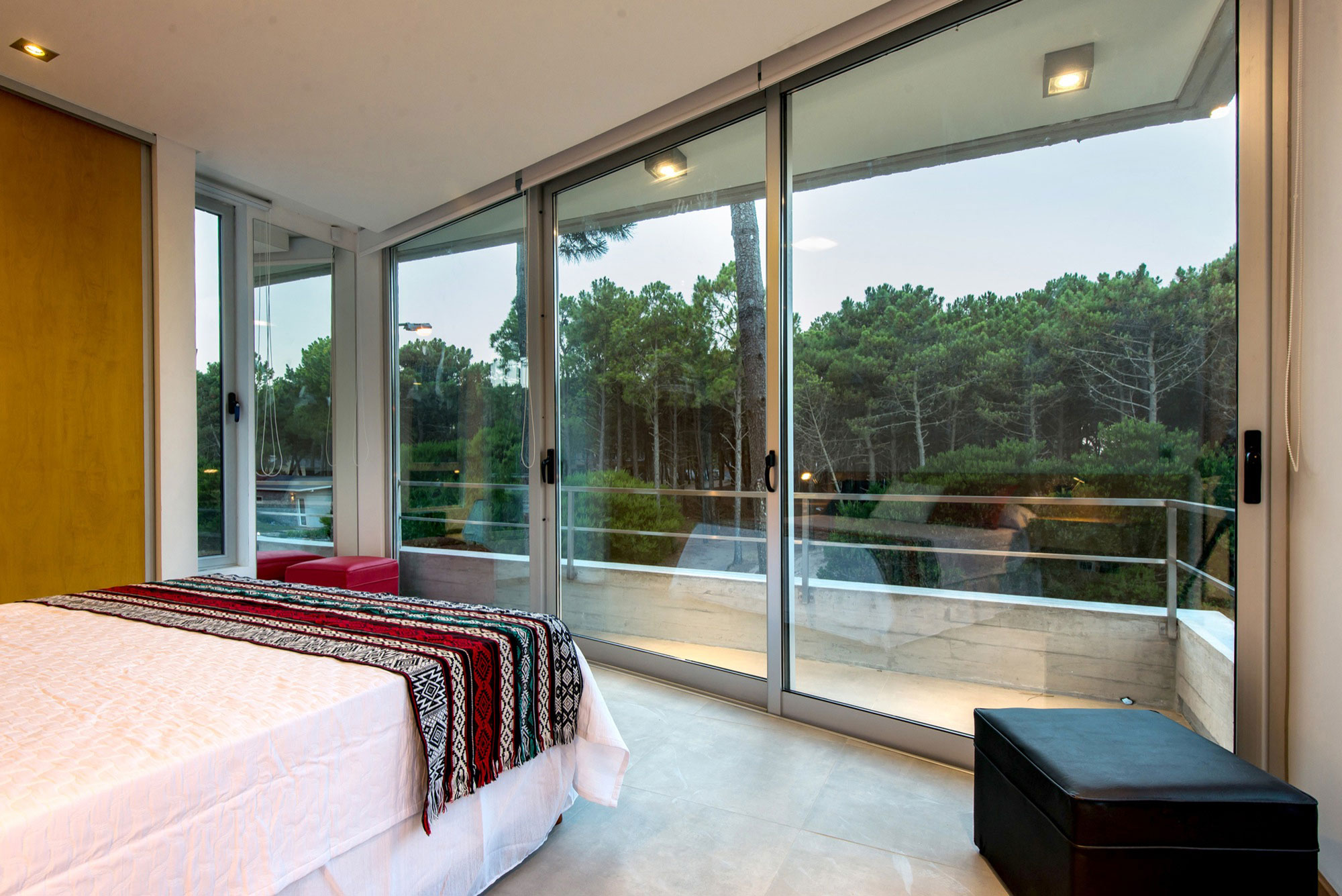 A Stylish Concrete Home Flanked by a Lush Pine Forest in Pinamar by Estudio Galera (15)