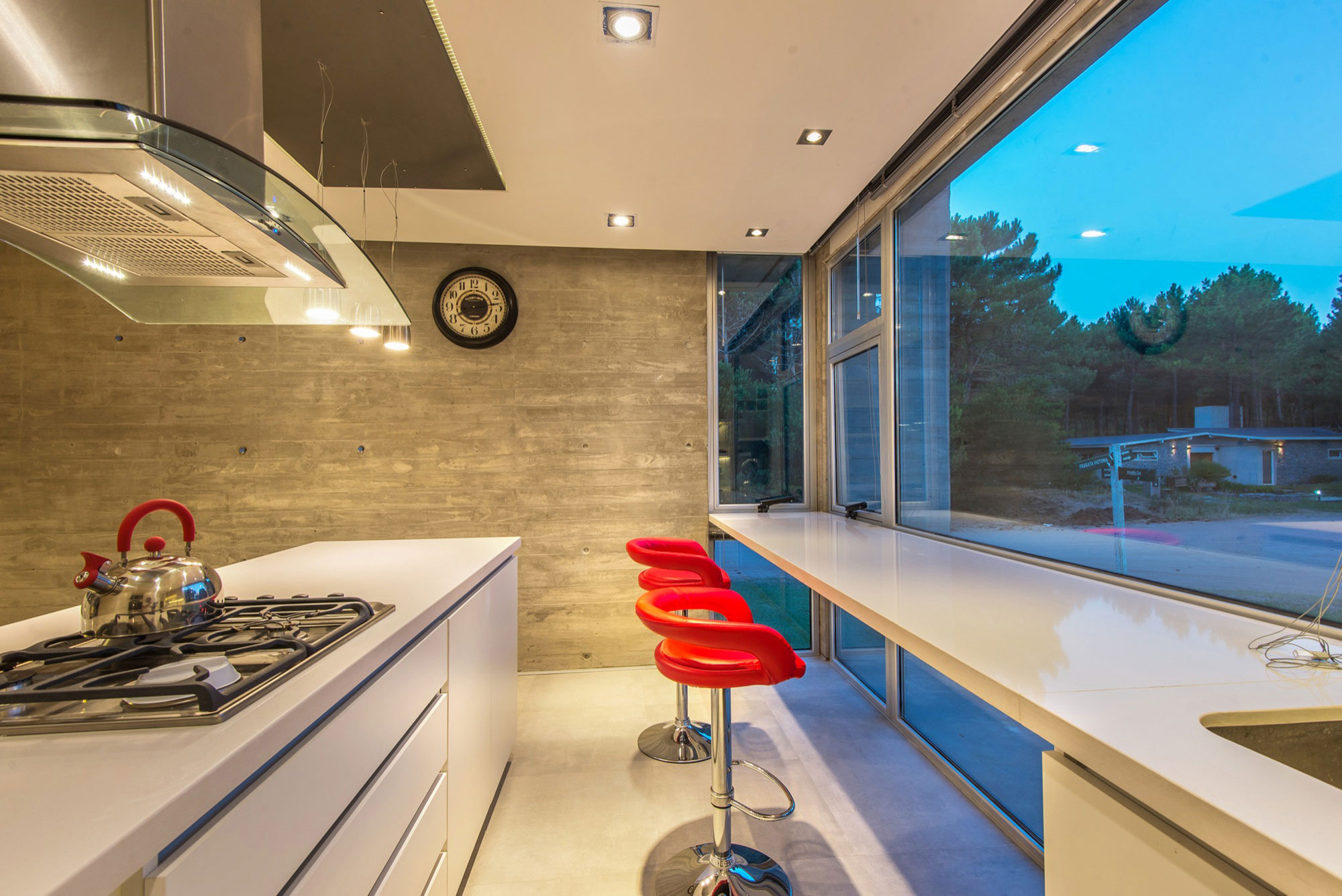 A Stylish Concrete Home Flanked by a Lush Pine Forest in Pinamar by Estudio Galera (17)