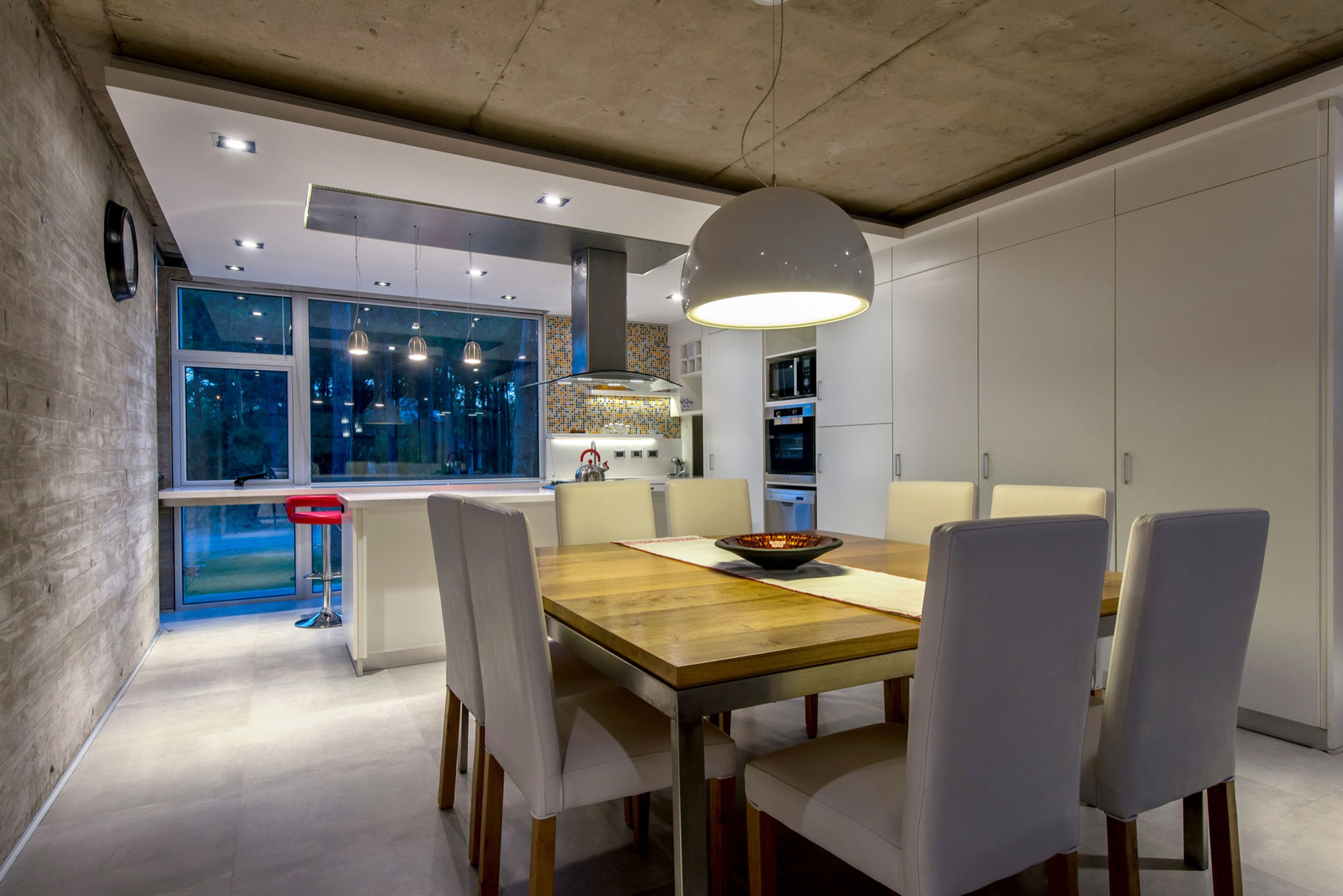 A Stylish Concrete Home Flanked by a Lush Pine Forest in Pinamar by Estudio Galera (18)
