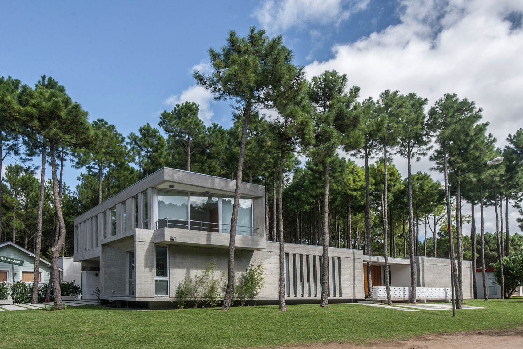 A Stylish Concrete Home Flanked by a Lush Pine Forest in Pinamar by Estudio Galera (2)
