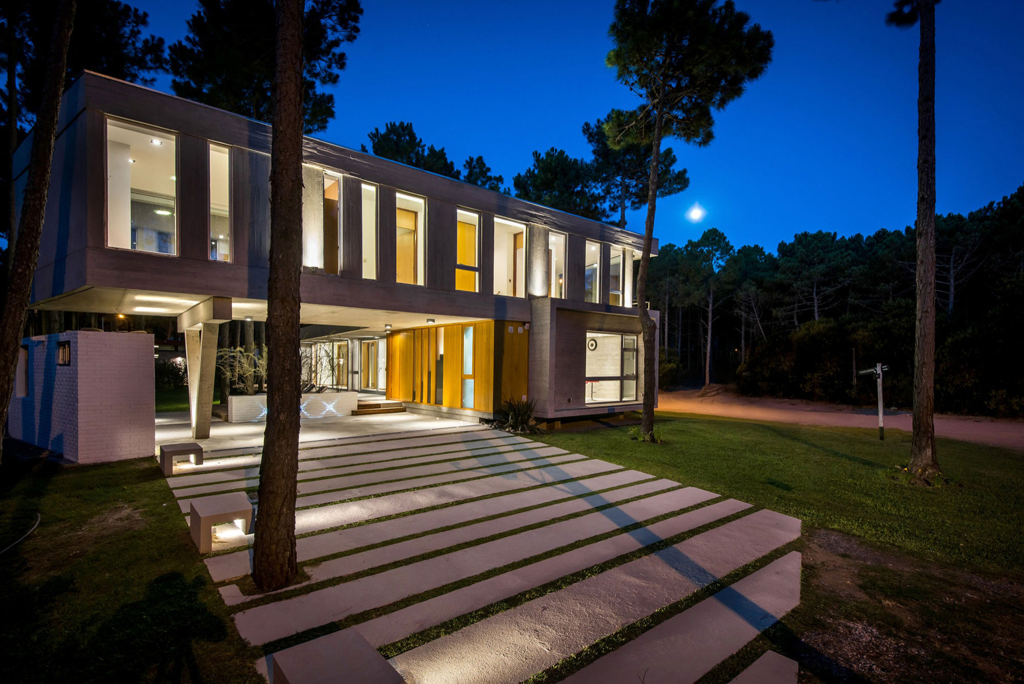 A Stylish Concrete Home Flanked by a Lush Pine Forest in Pinamar by Estudio Galera (22)