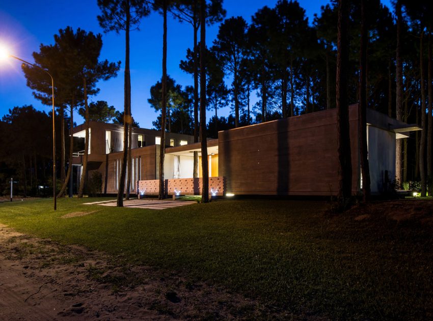 A Stylish Concrete Home Flanked by a Lush Pine Forest in Pinamar by Estudio Galera (25)