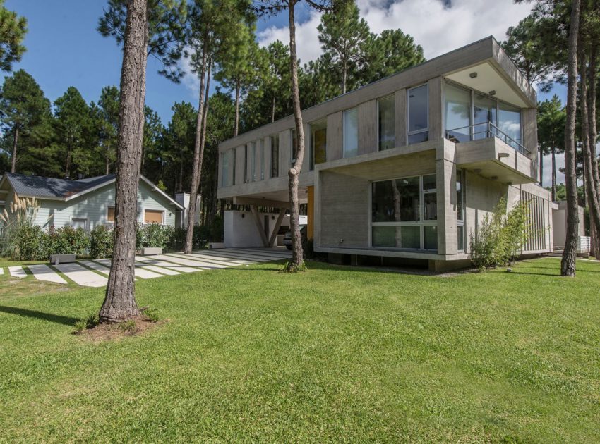 A Stylish Concrete Home Flanked by a Lush Pine Forest in Pinamar by Estudio Galera (4)