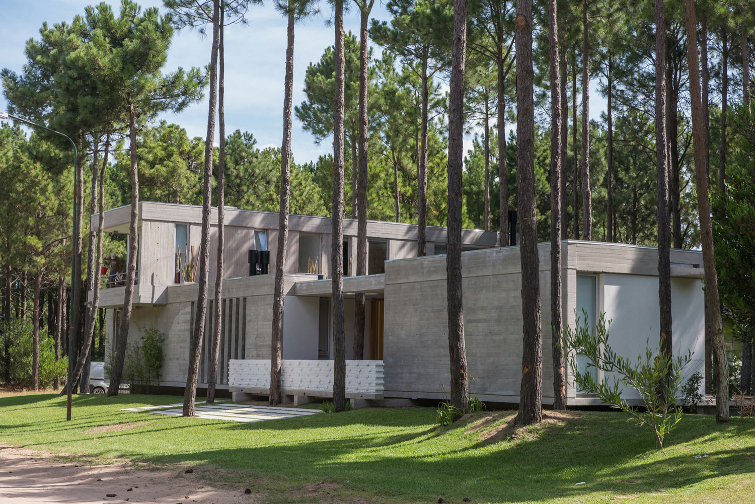 A Stylish Concrete Home Flanked by a Lush Pine Forest in Pinamar by Estudio Galera (5)