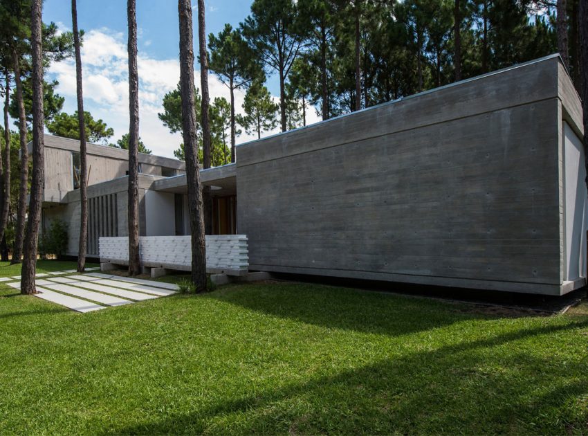 A Stylish Concrete Home Flanked by a Lush Pine Forest in Pinamar by Estudio Galera (6)