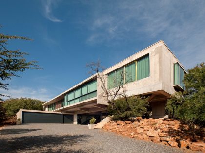 A Stylish Cantilevered Concrete Home with Stunning Character in Pretoria, South Africa by Earthworld Architects & Interiors (1)