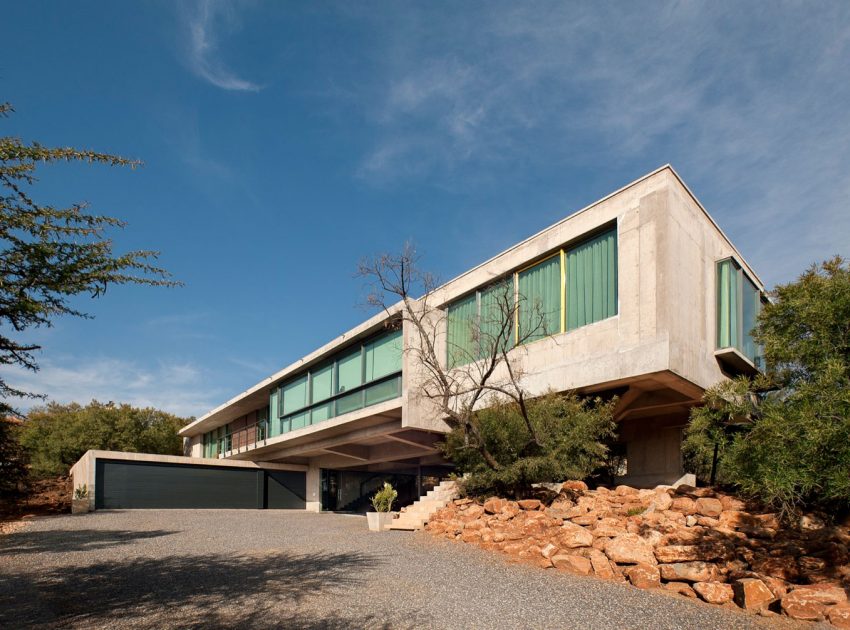 A Stylish Cantilevered Concrete Home with Stunning Character in Pretoria, South Africa by Earthworld Architects & Interiors (1)