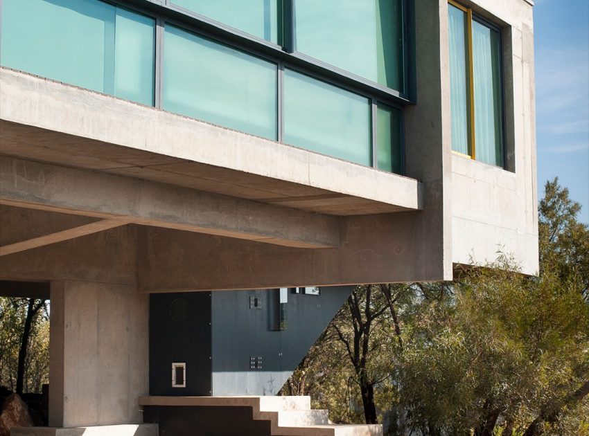 A Stylish Cantilevered Concrete Home with Stunning Character in Pretoria, South Africa by Earthworld Architects & Interiors (8)