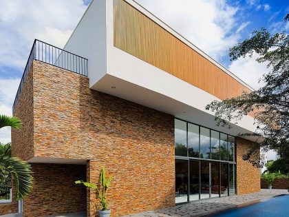 A Stylish Contemporary Home Composed of Two Interlocking Volumes in Ho Chi Minh City by MimA NYstudio + Real Architecture (1)