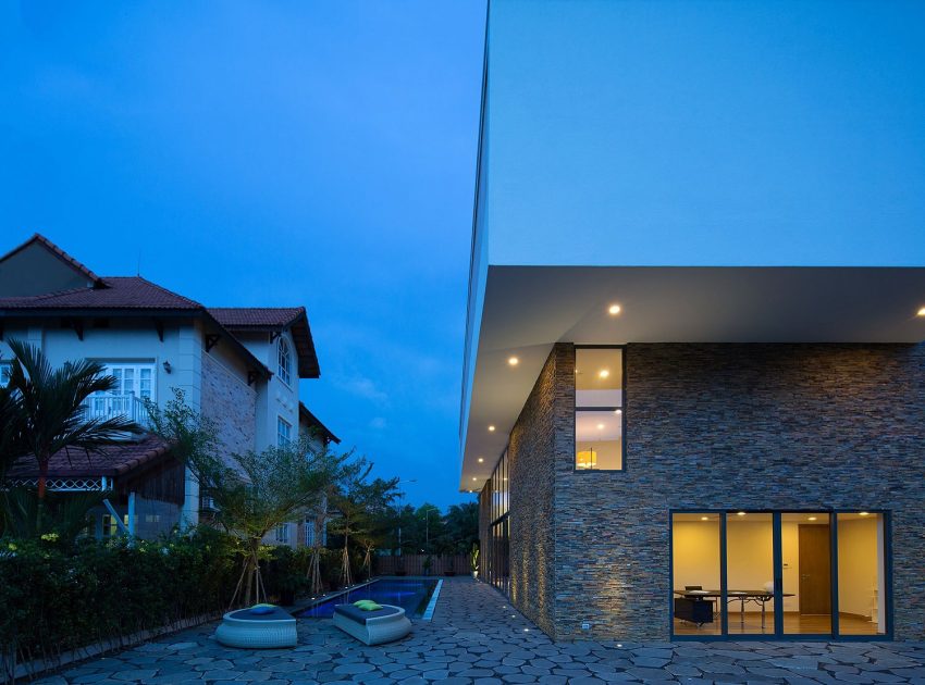 A Stylish Contemporary Home Composed of Two Interlocking Volumes in Ho Chi Minh City by MimA NYstudio + Real Architecture (16)