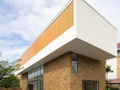 A Stylish Contemporary Home Composed of Two Interlocking Volumes in Ho Chi Minh City by MimA NYstudio + Real Architecture (2)