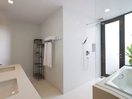 A Stylish Contemporary Home Composed of Two Interlocking Volumes in Ho Chi Minh City by MimA NYstudio + Real Architecture (9)