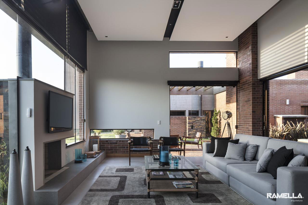 A Stylish Contemporary Home Made of Concrete and Red Bricks in Rio Grande do Sul by Ramella Arquitetura (11)